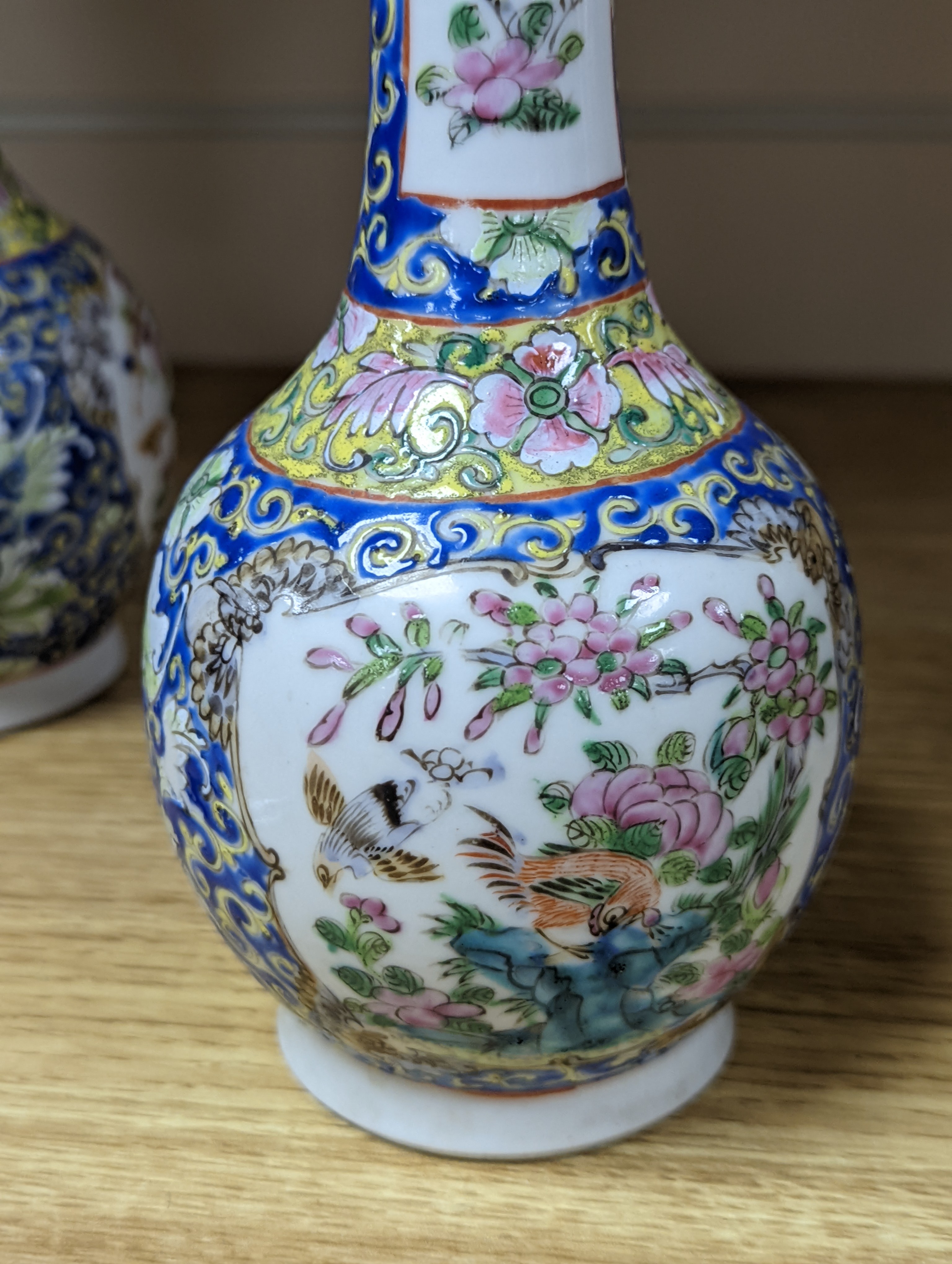 Four 19th century Chinese famille rose vases, 21cm
